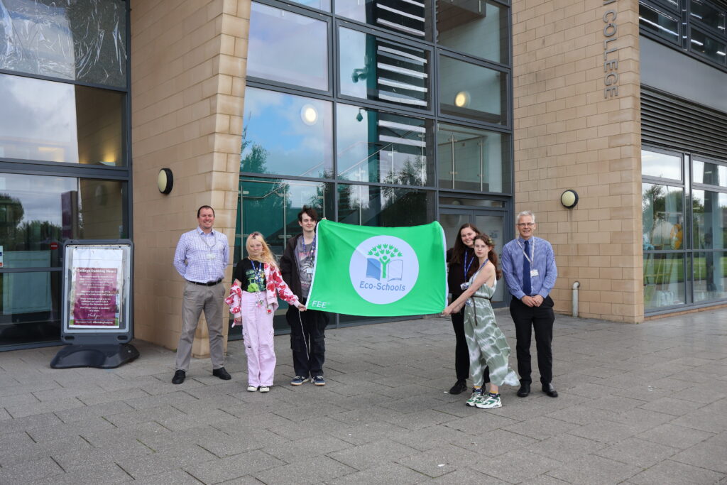 Photo of members of the college's Eco Committee and Eco Action Group with Green Flag